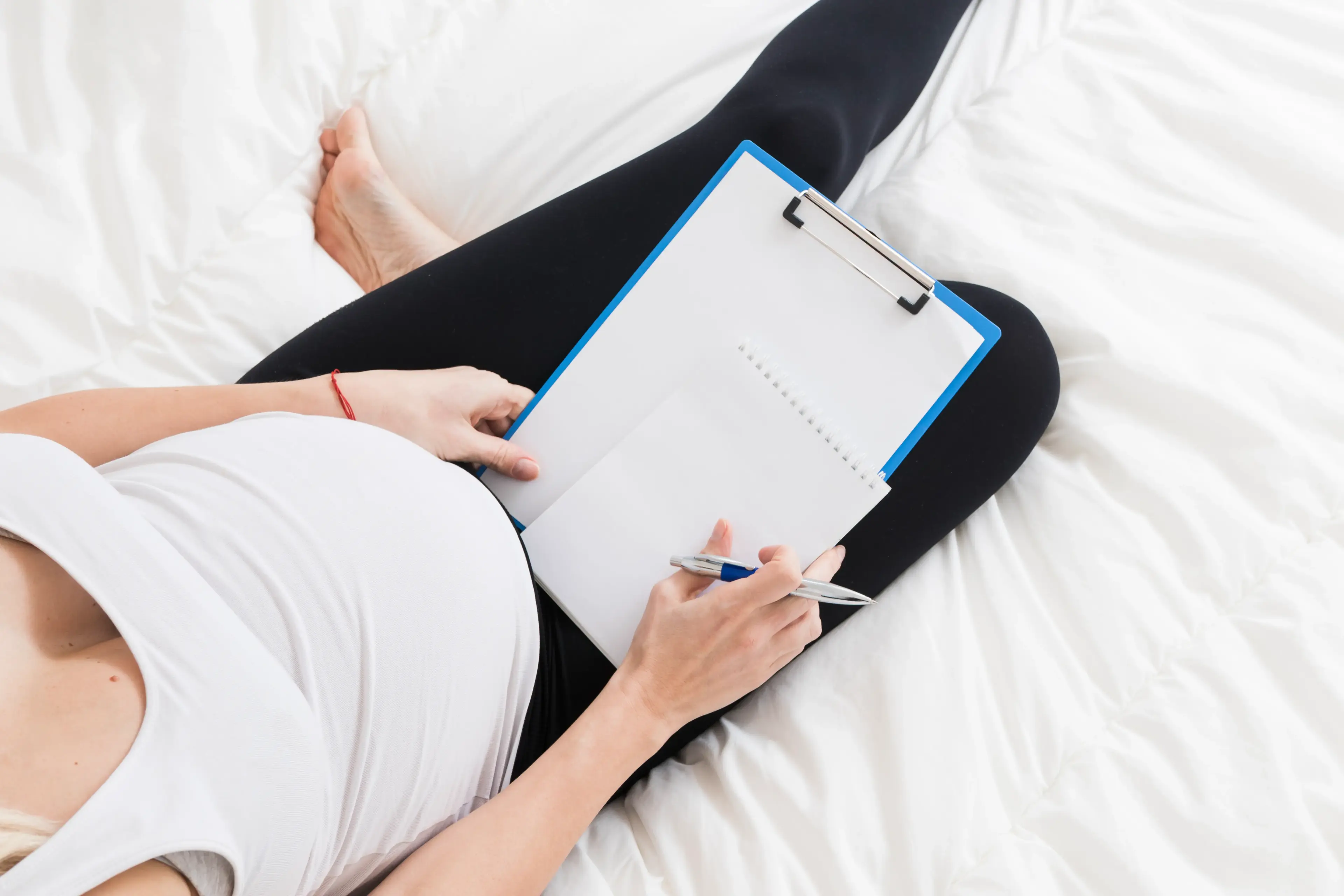 Expectant mother writing a birth plan